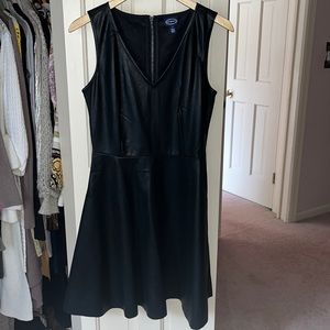 Perfect little black leather like dress. A definite must have. NWT/NBW